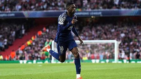 Arsenal beaten by Paris St Germain to dent Champions League final hopes