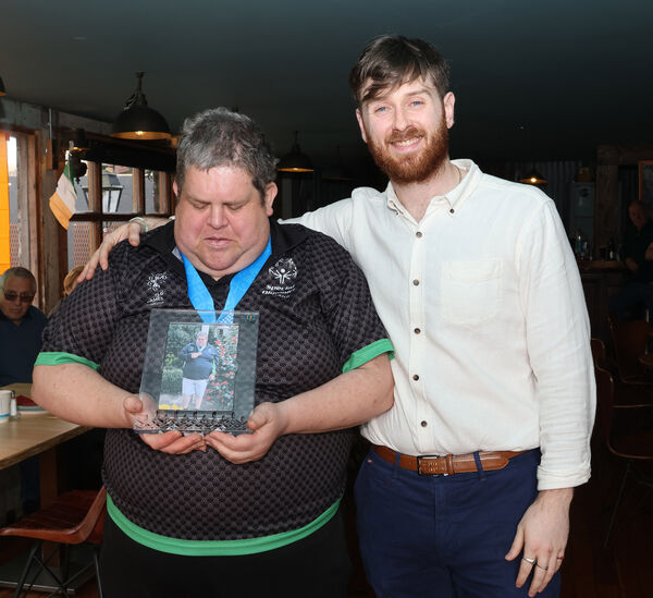  Jacob Beckett, Riverside Cottage Dunmore Road, made a presentation to James Upton, to mark James bronze medal win in Floorball representing Ireland in the Special Olympics held in Turin. Photo: Joe Evans