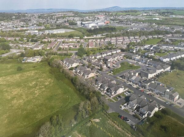 The green site where plans are being developed for a community park.