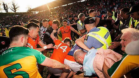 Ulster final ends in ugly scenes as Donegal and Armagh camps clash
