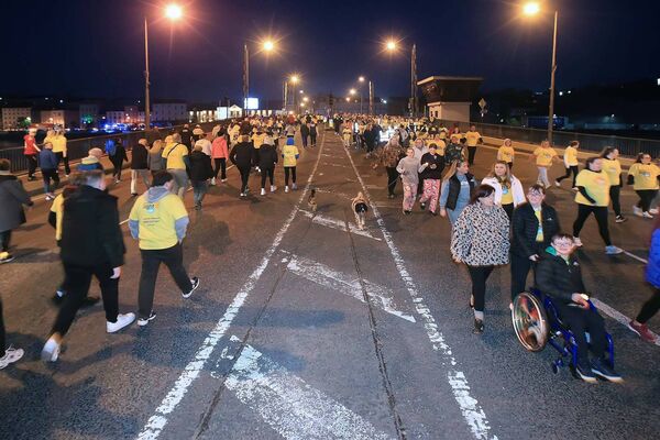 The Waterford Darkness Into Light walk crossing Rice Bridge. Photo: Noel Browne The Waterford Darkness Into Light walk crossing Rice Bridge. Photo: Noel Browne