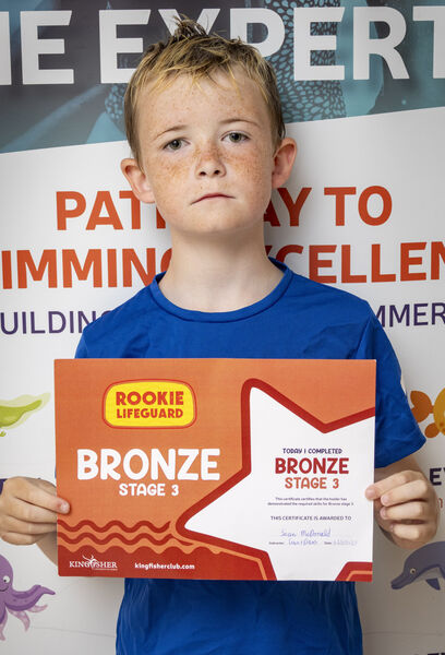 Sean, who received his Rookie Lifeguard, Bronze Stage 3 swimming certificate at Kingfisher. Sean, who received his Rookie Lifeguard, Bronze Stage 3 swimming certificate at Kingfisher.