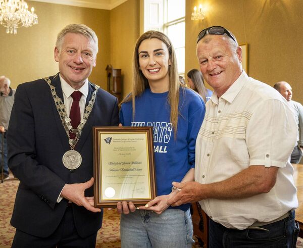 Mayor of Waterford City & County Cllr Jason Murphy presented a scroll to Wildcats Captain Helena Rohan on behalf of the team, also pictured is Cllr Jim Griffin. Mayor of Waterford City & County Cllr Jason Murphy presented a scroll to Wildcats Captain Helena Rohan on behalf of the team, also pictured is Cllr Jim Griffin.