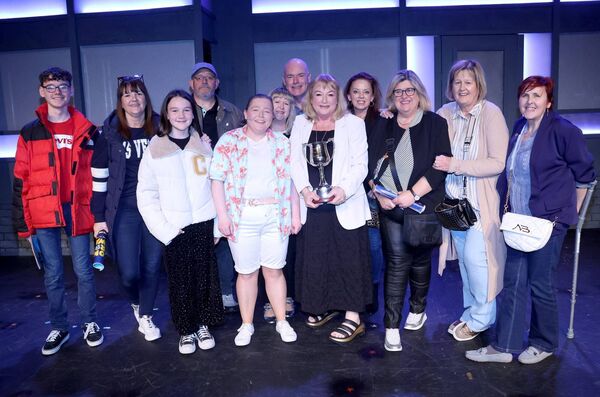 Brenda Giles, was honoured with the Denny Corcoran Unsung Hero Award at Garter Lane during the production of Everybody's Talking About Jamie. Brenda is pictured here with family and friends. Photo: Joe Evans