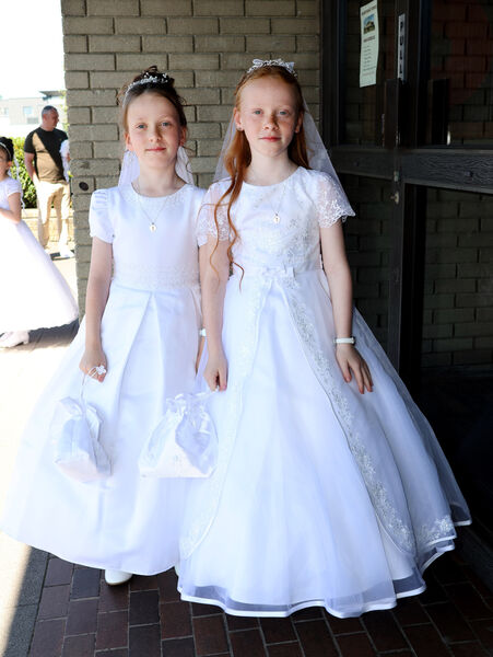  Kate and Grace Cleary, St. Ursula's, who received their First Holy Communion at the Sacred Heart Church.
