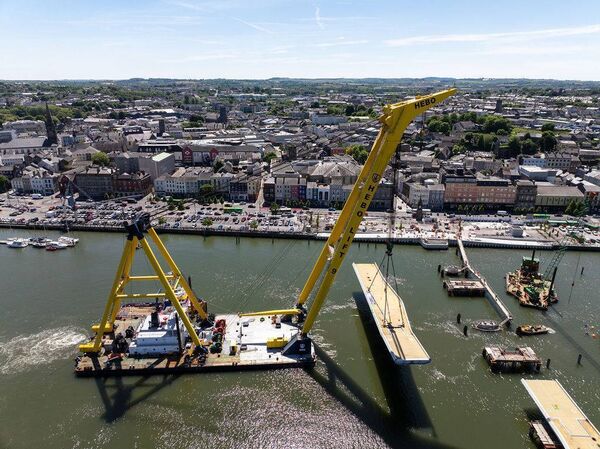 The second span of the Sustainable Transport Bridge is carried towards its final position. Pic: Peter Grogan.