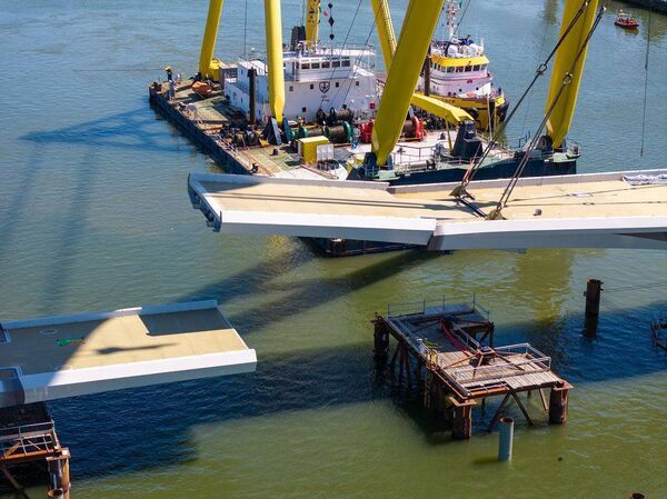 The second span of the Sustainable Transport Bridge is carried towards its final position. Pic: Peter Grogan.