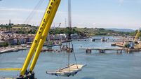 Bridge installation paused due to weather