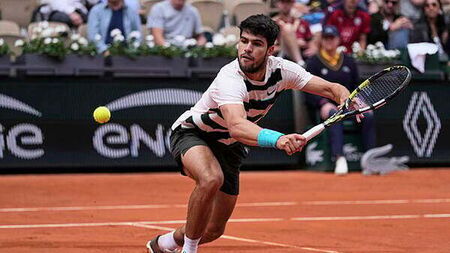 Carlos Alcaraz eases to straight-sets victory in French Open defence