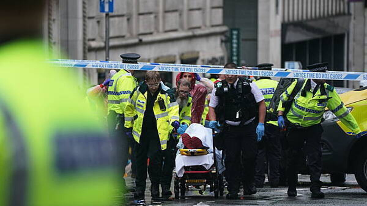 Man detained after car collides with pedestrians during Premier League parade