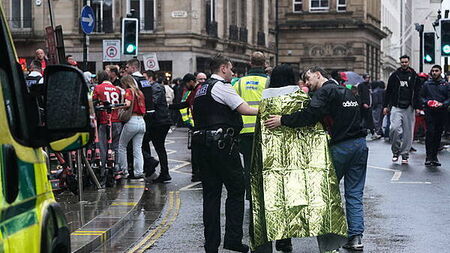 Man arrested after car ploughs into crowds of people at Liverpool victory parade