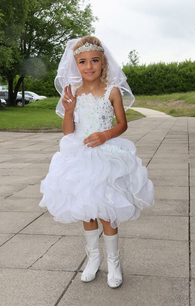 Nellie O'Reilly, St. Saviour's, who received her First Holy Communion at St. Saviour's Church. Nellie O'Reilly, St. Saviour's, who received her First Holy Communion at St. Saviour's Church.