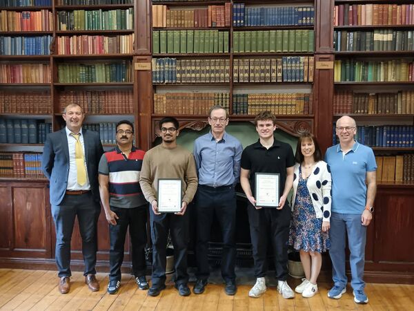 Delvin Louis and Sam McLoughlin pictured with Principal Mr. Tom Bourke, their families and Mr. Tim Brosnan, their DCG teacher.