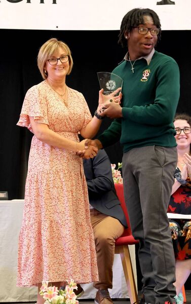 Ms. Whelan presented the TY Mentor of the Year award to Olu John, at the St. Paul's Community College TY Graduation Evening. Photo: Joe Evans