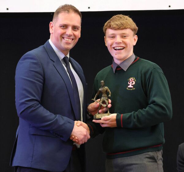 Mr. Bailey, Deputy Principal, presented the Junior Hurling Player of the Year award to Paul, at the St. Paul's Community College TY Graduation Evening. Photo: Joe Evans