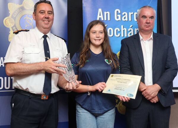 Chief Superintendent, Anthony Pettit, Eilish Norris, Individual Award Winner, and Garda Seamus Ronan. Chief Superintendent, Anthony Pettit, Eilish Norris, Individual Award Winner, and Garda Seamus Ronan.