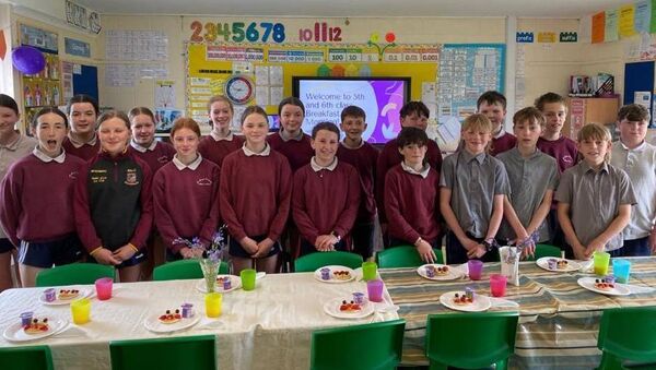 he 5th and 6th class pupils of Touraneena National School, enjoying their Childline fundraiser with pupils from the Tír na nÓg playschool, Touraneena