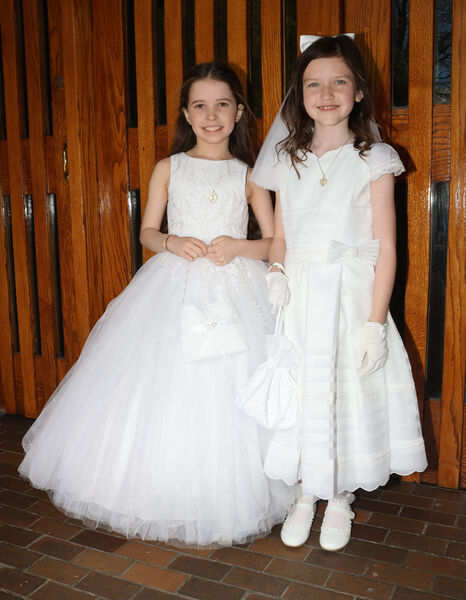  Juliet O'Brien and Rachel Kinsella, St. John of God, who received their First Holy Communion at St. Joseph and Benildus Church.