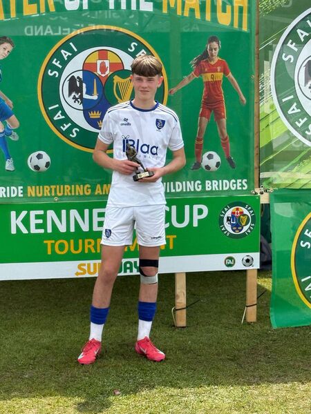 Tom Gahan pictured with his player of the match award.