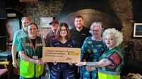 Cheques are presented to groups in Waterford supported by local Christmas charity single