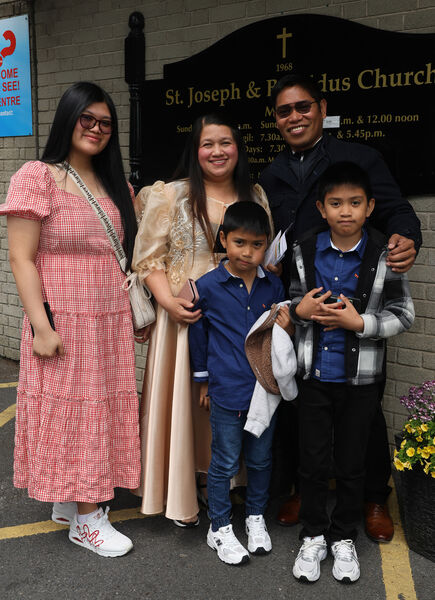  Members of the Filipino community at the Pentecost Sunday Celebration at St. Joseph and St Benildus Church.