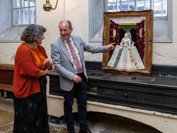 Jessica Bonenfant, Artistic Director Greywood Arts and Cllr Dominic Finn deputising for the Mayor of the County of Cork looking at an artwork by Matt Ind in the kitchen at Fota House