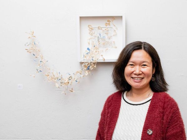 Mór Artists Collective Member Jeni Wu with her artwork at the Launch of Mór Collective Art Exhibition at Fota House