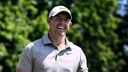 Rory McIlroy trails by two as Scottie Scheffler holds share of lead