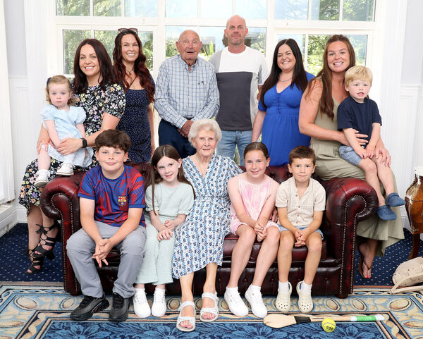  Tom and Evelyn Collins pictured her with their grandchildren and great grandchildren.