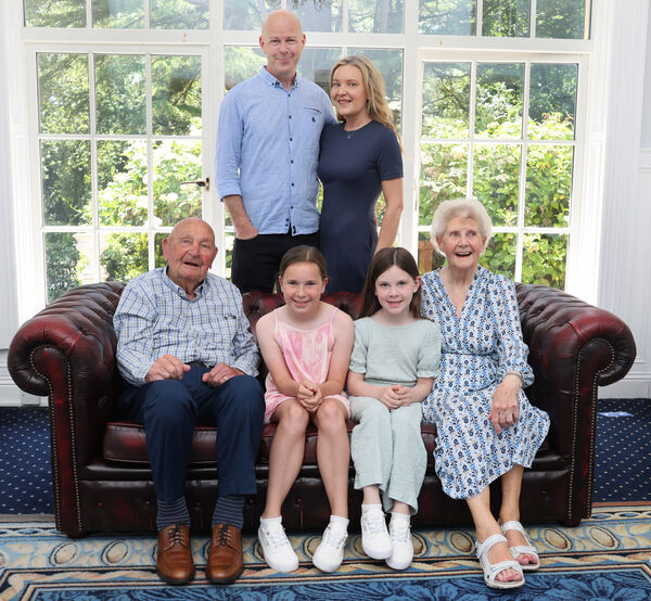 Tom and Evelyn Collins recently marked an extraordinary milestone, their 70th wedding anniversary, with a joyful celebration at the Greenway Manor Hotel. They are pictured here with their son David and his family. Tom and Evelyn Collins recently marked an extraordinary milestone, their 70th wedding anniversary, with a joyful celebration at the Greenway Manor Hotel. They are pictured here with their son David and his family.
