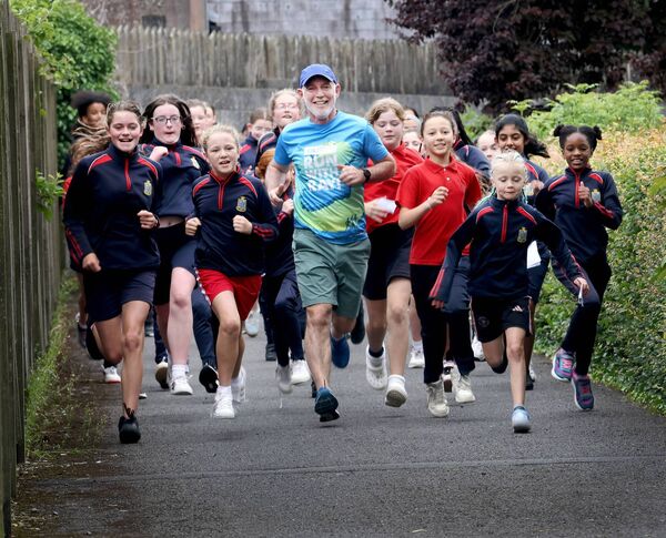 Ray D'Arcy jogs with students from St. Ursula's Primary School to promote the Daily Mile Programme. Ray D'Arcy jogs with students from St. Ursula's Primary School to promote the Daily Mile Programme.