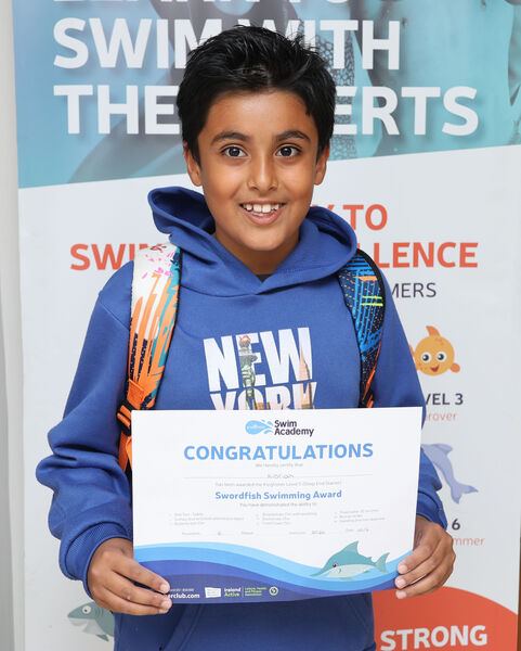  Kidrian, who received his Level 5 swimming certificate at Kingfisher.