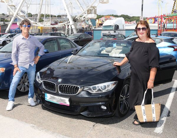 Alberto and June, enjoying a day out in Tramore in their new car. 