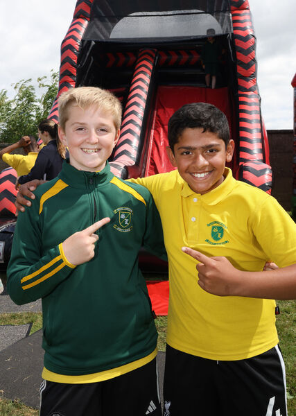  Noah and Aaron, fifth class pupils waiting for their turn on the bouncy castle at the Scoil Lorcain end of term fun day.