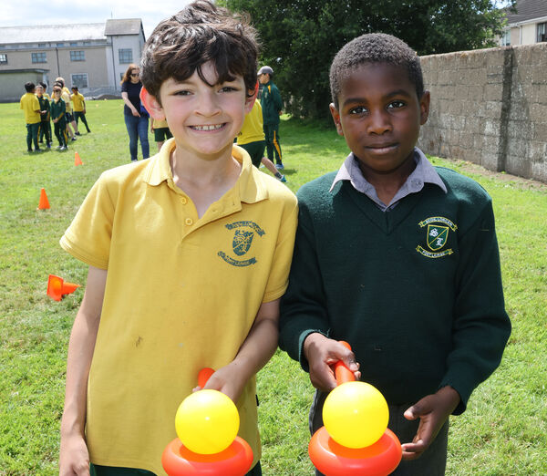  Charlie and Kilson, taking part in the 2nd class egg and spoon challenge at the Scoil Lorcain end of term fun day.