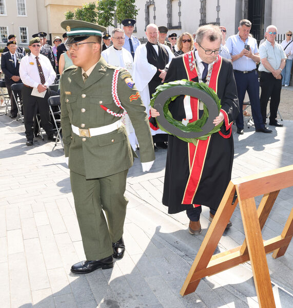 Corporal Kieran Macaraeg presented the wreath to Mayor of Waterford City & County Cllr Seamus Ryan, at the Waterford National Day of Commemoration. Corporal Kieran Macaraeg presented the wreath to Mayor of Waterford City & County Cllr Seamus Ryan, at the Waterford National Day of Commemoration.