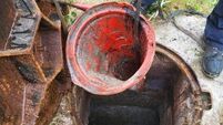 Untreated sewage including 'solids' visible metres from Waterford beach as traffic cone used as make-shift filter 