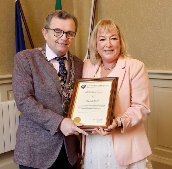 Mayor of Waterford City &amp; County Cllr Seamus Ryan presenting a scroll to Brenda Giles, in recognition of her winning best female in an amateur drama for her role in 'Up Down Boy'. Photo: Joe Evans
