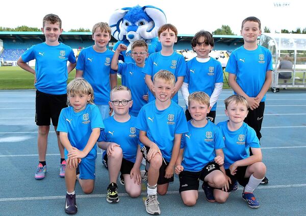 The mascots, Fionn Murphy, Evan Quilty, Andrew Cowman, Tom McKeena, Magnus Byrne, Conor Phelan, Charlie Curran, Logan Fitzpatrick, Dylan Berry, Jamie King, and James Forristal pictured before the game.