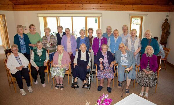 Sr Teresin a with Back row: Sisters Freda McGrath, Kate Nolan, Bernadette Madden, Catherine McCarthy, Esther McCarthy, Brigitte Dalton, Palma Penkert, Ellen ’Leary, Mary Mullins, Teresa McCarthy, Mary Gough, Madeline Fitzpatrick, Virginia Mullane. Front row: Philippa O’Sullivan, Patricia McGrath, Dolores Carrol, Margaret Mary Morris, Teresina O’Byrne, Patricia Butler, Clare O’Keeffe. Sr Teresin a with Back row: Sisters Freda McGrath, Kate Nolan, Bernadette Madden, Catherine McCarthy, Esther McCarthy, Brigitte Dalton, Palma Penkert, Ellen ’Leary, Mary Mullins, Teresa McCarthy, Mary Gough, Madeline Fitzpatrick, Virginia Mullane. Front row: Philippa O’Sullivan, Patricia McGrath, Dolores Carrol, Margaret Mary Morris, Teresina O’Byrne, Patricia Butler, Clare O’Keeffe.