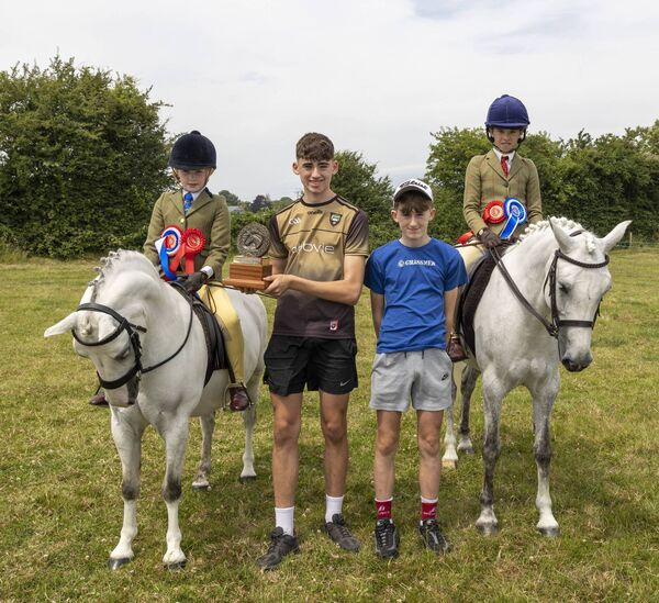 Devereux Bronze Trophy. Penny Toomey (champion) on 'Rookery Haribo' Leon Devereux, Olan Devereux, and Trish O’Donnell on 'Cluainin Spring Johnson'.