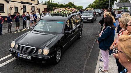 Murdered mother and children ‘together and finally safe’ – funeral hears