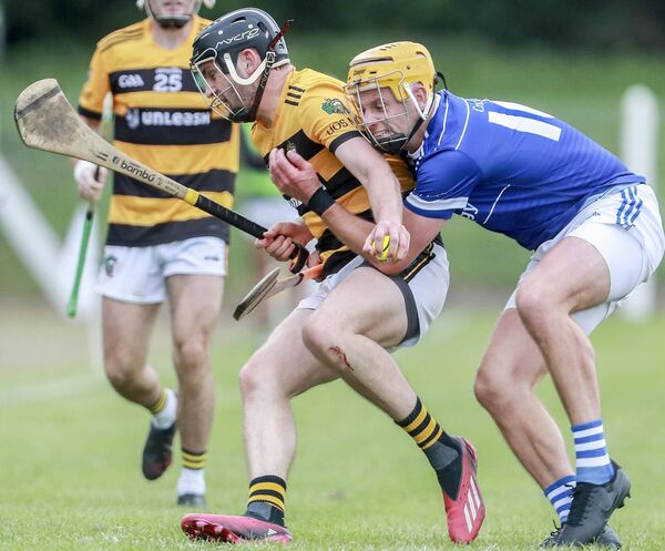 Lismore's Finbar Reaney is tackled by Mount Sion man of the match Martin O'Neill during their JJ Kavanagh &amp; Sons Co. Senior hurling championship clash played at Cappoquin Logistics Fraher Field on Saturday last. Photos: Sean Byrne