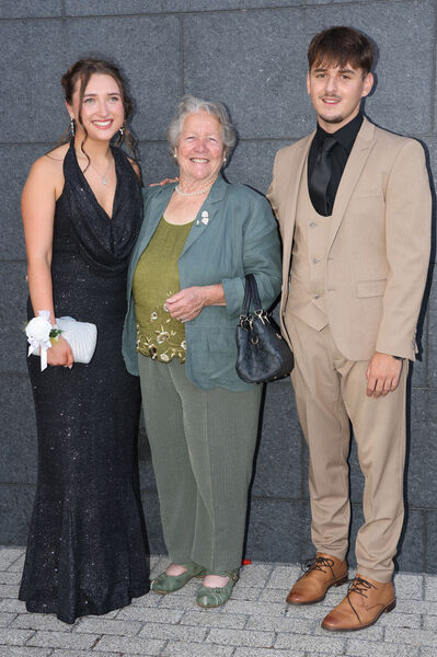 Cousins Annie Kelly and Mikey Power with their granny Dolly Moloney at the Ardscoil Na Mara Graduation Ball. Cousins Annie Kelly and Mikey Power with their granny Dolly Moloney at the Ardscoil Na Mara Graduation Ball.