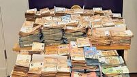 Three men remanded in custody after gardaí seize €1.28m in cash