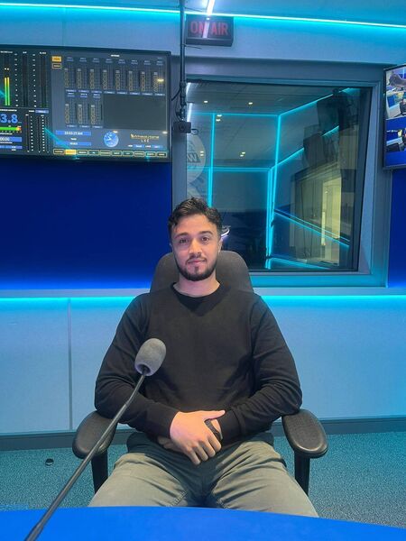 Dr. Momin Hilles in studio in WLR FM during his interview on Deise Today with Damien Tiernan.