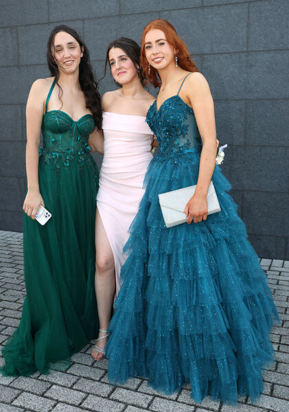 Erica Cecan, Amy Hutchinson and Emma Corkery at the Ardscoil na Mara Debs Ball. Erica Cecan, Amy Hutchinson and Emma Corkery at the Ardscoil na Mara Debs Ball.