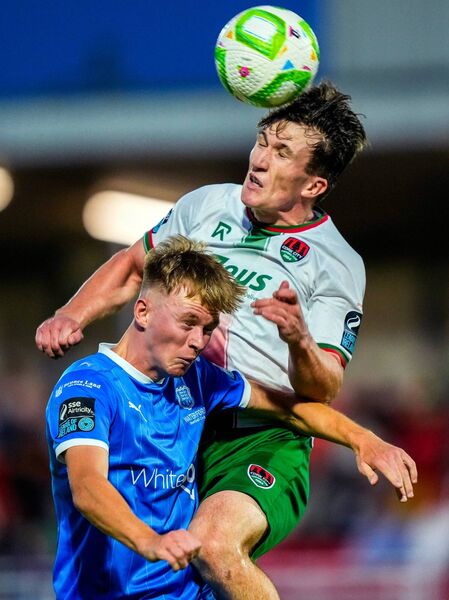 Cork City's Josh Fitzpatrick in an aerial duel with Waterford's Conan Noonan. Cork City's Josh Fitzpatrick in an aerial duel with Waterford's Conan Noonan.