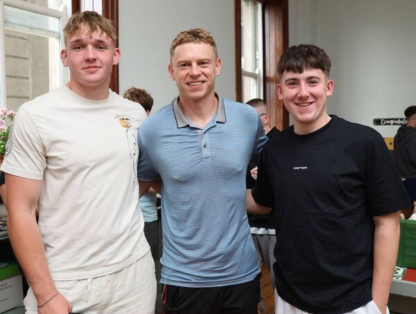 Teacher Philip O'Mahony with Bobby and Ben. Photo: Joe Evans