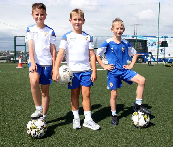 St. Joseph FC players, Jacob, Sean and Kacper, at the Sacred Heart Family Resource Centre, Fun Day. Photo: Joe Evans St. Joseph FC players, Jacob, Sean and Kacper, at the Sacred Heart Family Resource Centre, Fun Day. Photo: Joe Evans